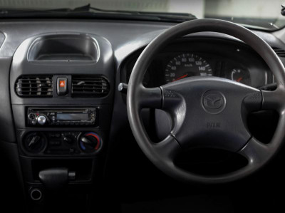 Mazda Familia 1.5 AT (110 л.с.)