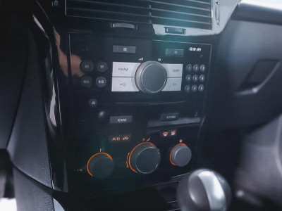 Opel Astra 1.6 Easytronic (115 л. с.)