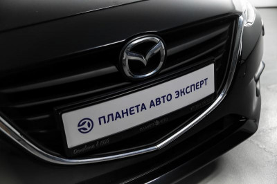 Mazda 3 1.6 AT (104 л. с.)